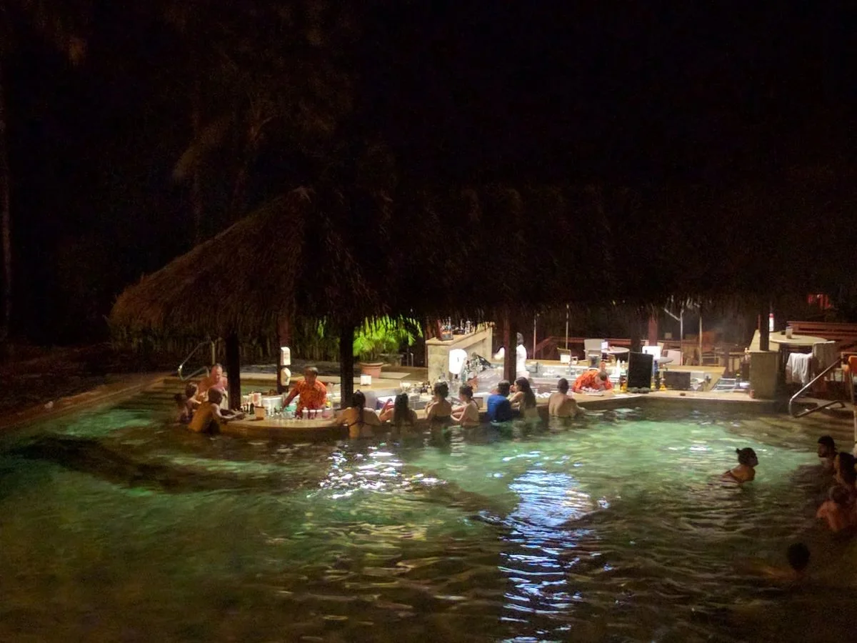 Swim-up bar attached to a geothermal pool at Tabacón hot springs in La Fortuna Costa Rica